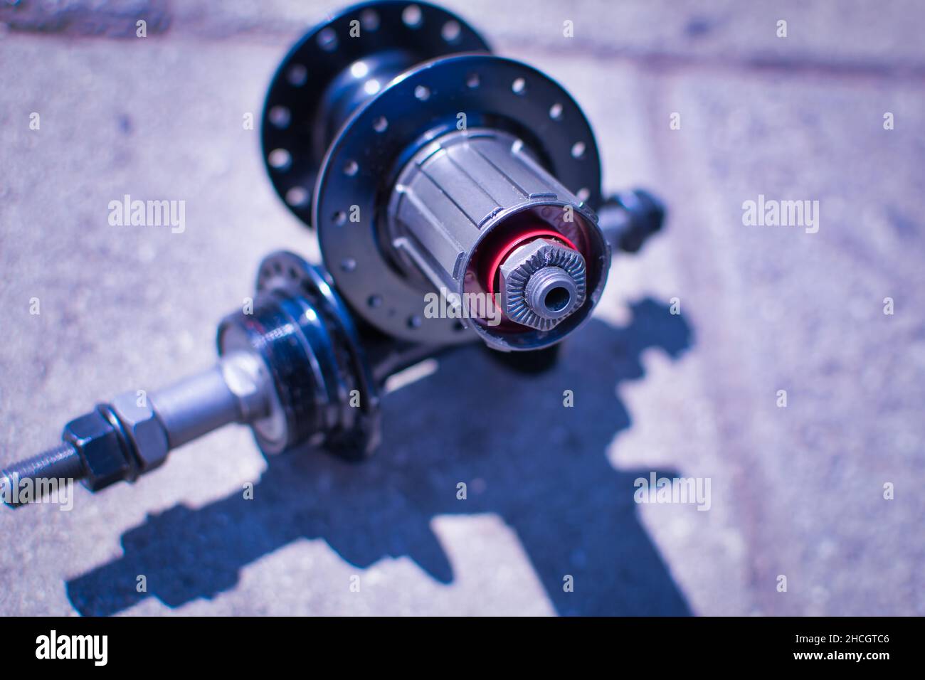 Bicycle wheels new hub on display on the ground. Metallic look