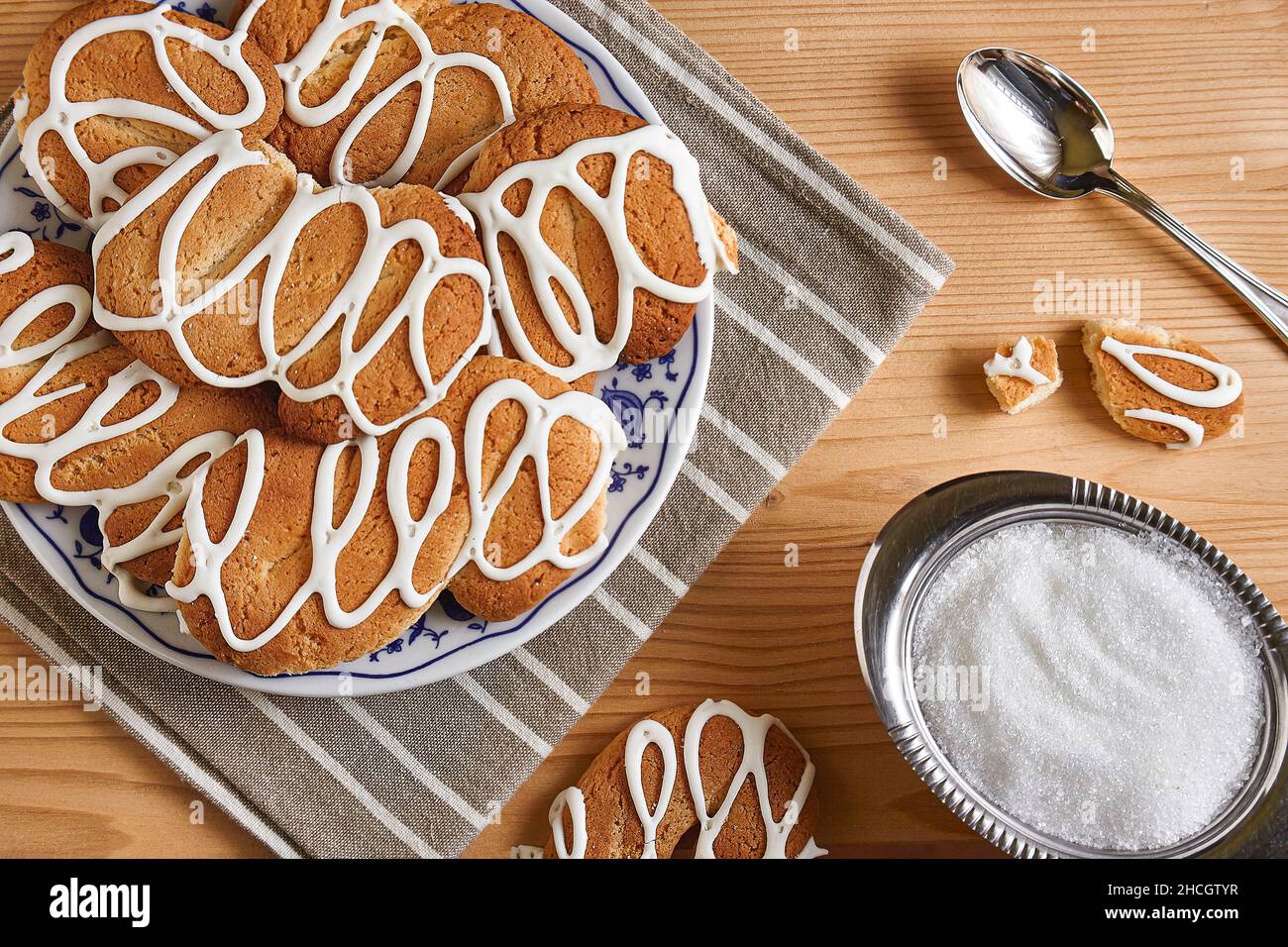 Composition with biscuits on a wooden table with sugar and teaspoon Stock Photo