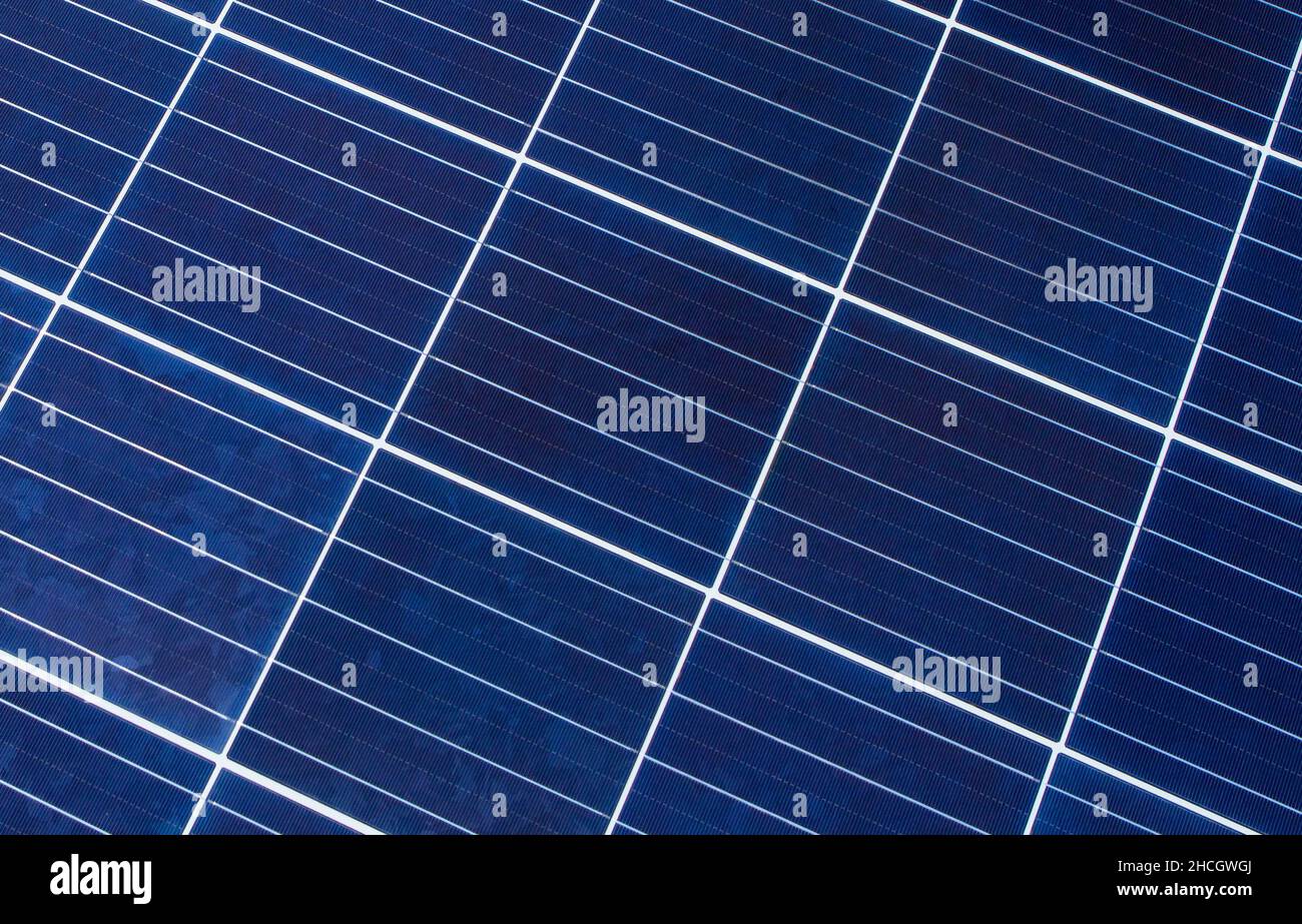 Close-up of Solar energy panel photovoltaics module in the sea offshore. Solar panel texture. Stock Photo