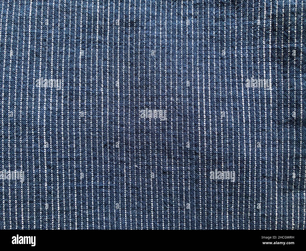 White stripes on blue fabric background Stock Photo