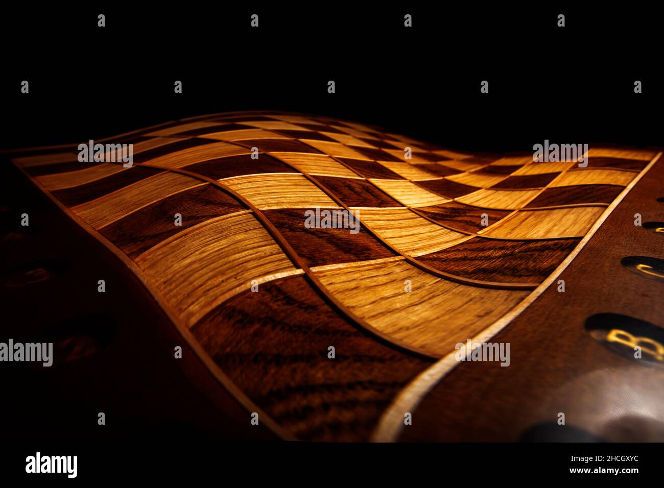 Chess winding box on a dark background. Stock Photo