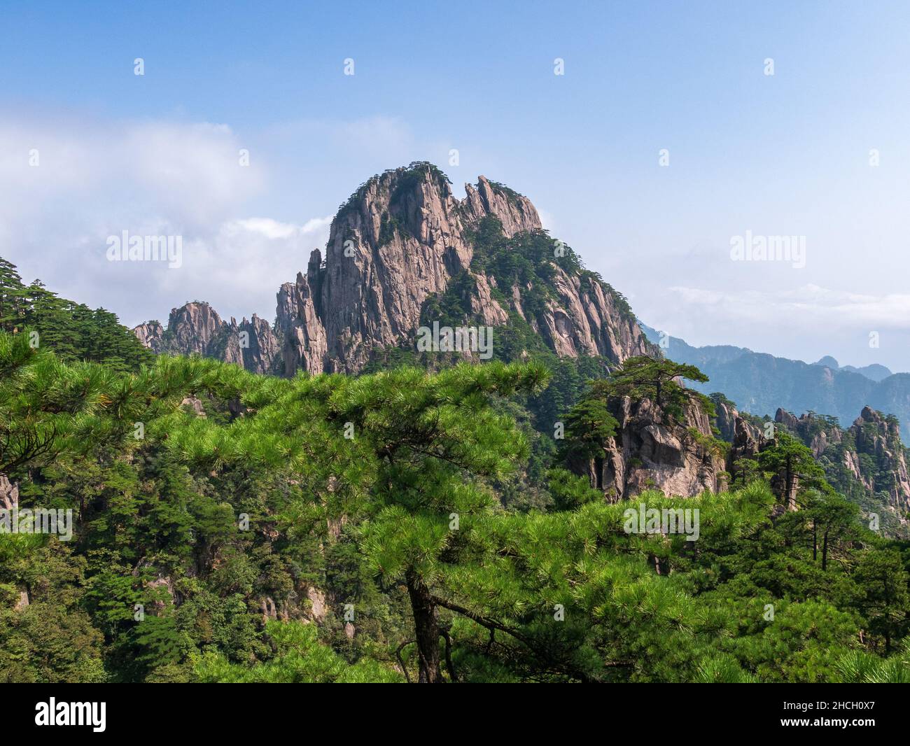Rock at the yellow mountains with a beautiful blue sky on a summer day, Huangshan mountains, Anhui, Huangshan, China, Asia, Stock photo Stock Photo