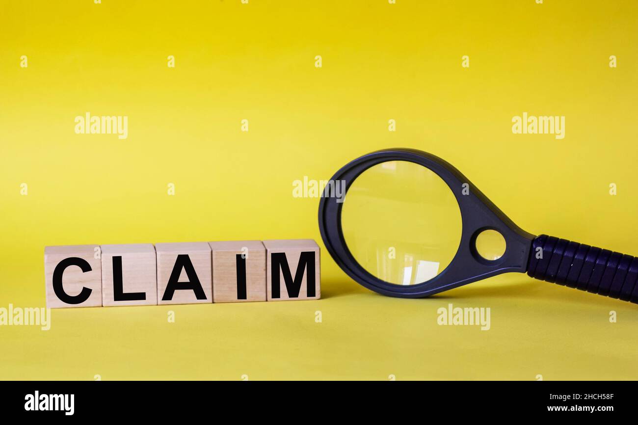Claim word concept. Wooden Blocks close up view Stock Photo