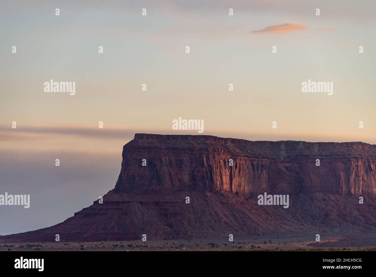Monument Valley Arizona Utah scenic butte at sunrise.  Stock Photo