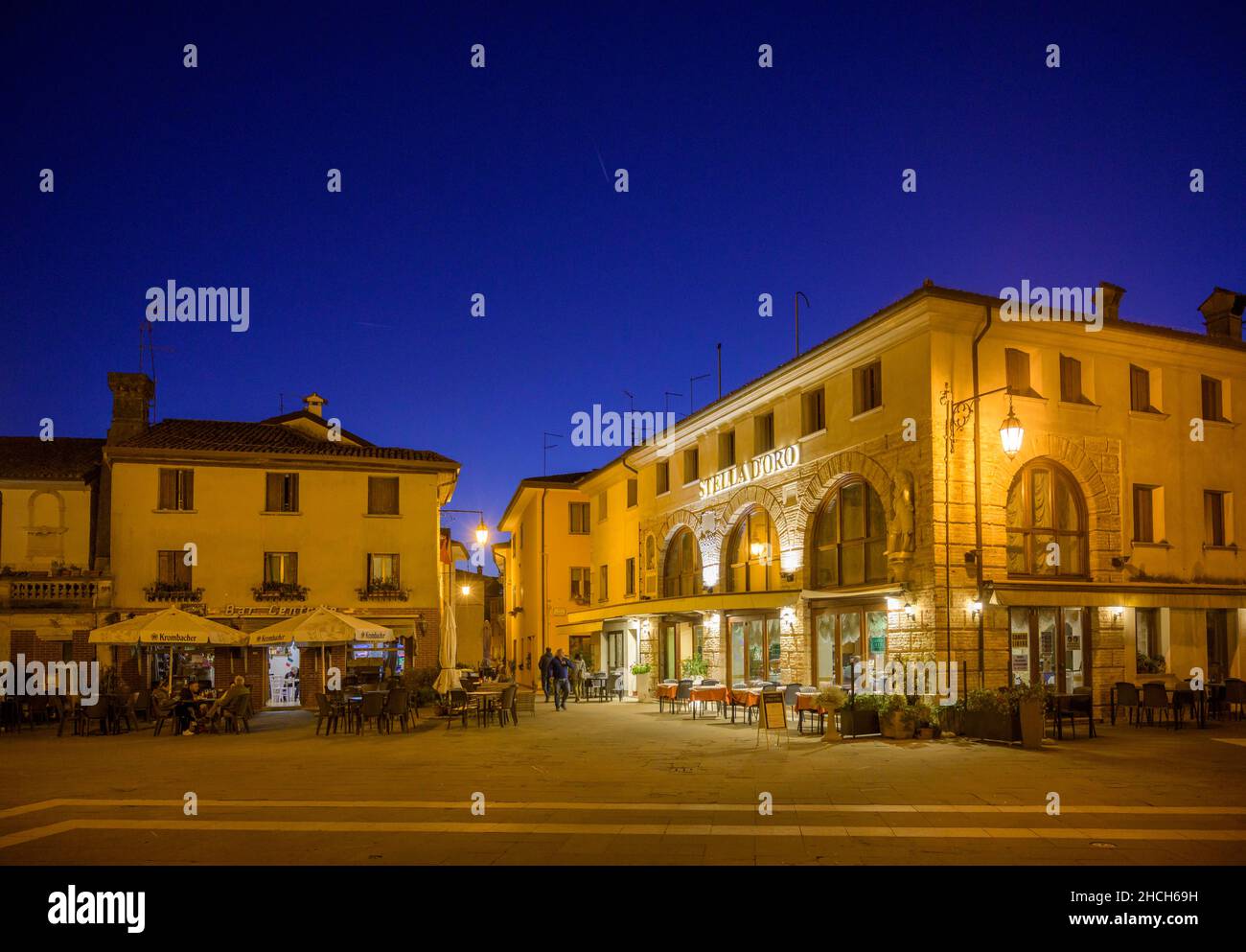 Evening shot from the square at Torre Millenaria, Marano Lagunare, province of Udine, Italy Stock Photo