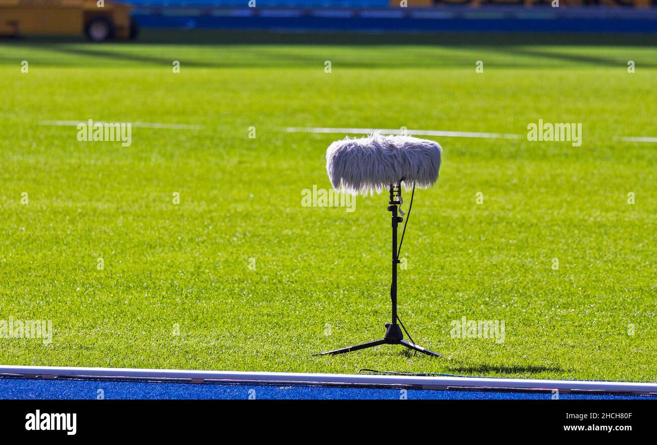 Directional microphone with tripod stands on the lawn of the Olympiastadion, Berlin, Germany Stock Photo