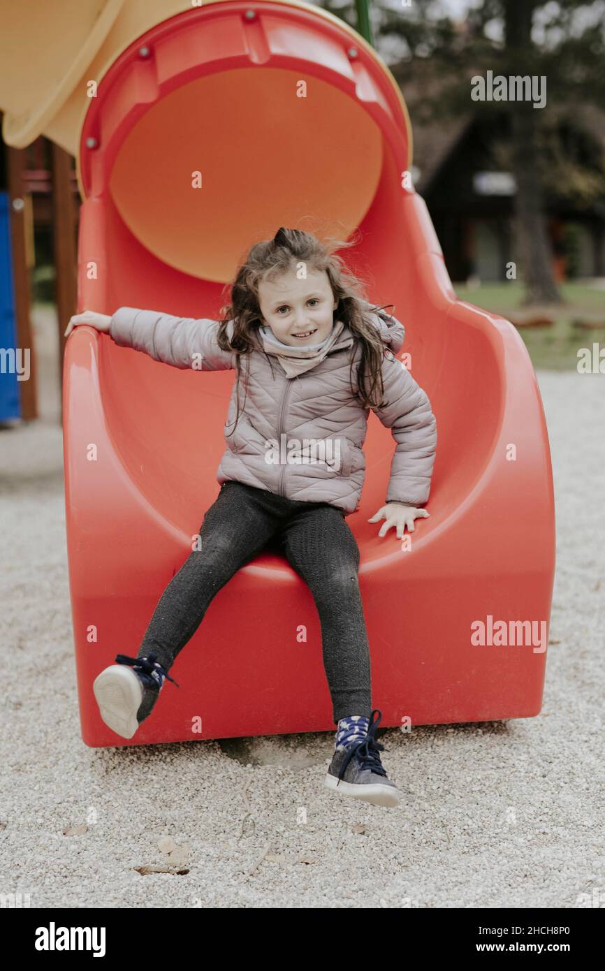 Girl on a slide Stock Photo - Alamy