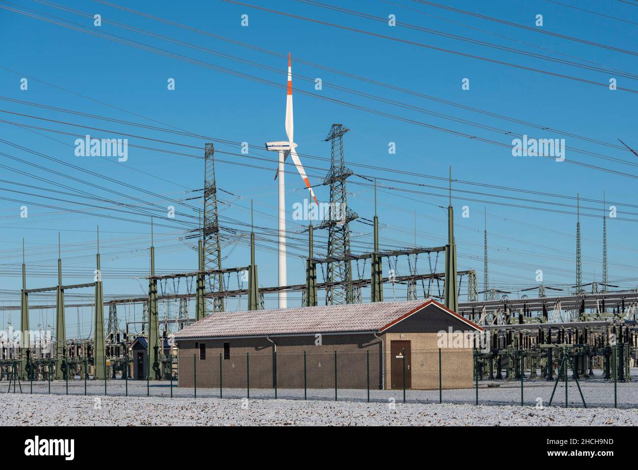 Power pylons, capacitors, wind turbine, substation, Wolmirstedt, Saxony