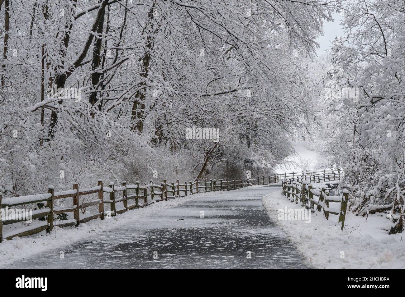 Country road covered in fresh snow in rural Pennsylvania Stock Photo ...