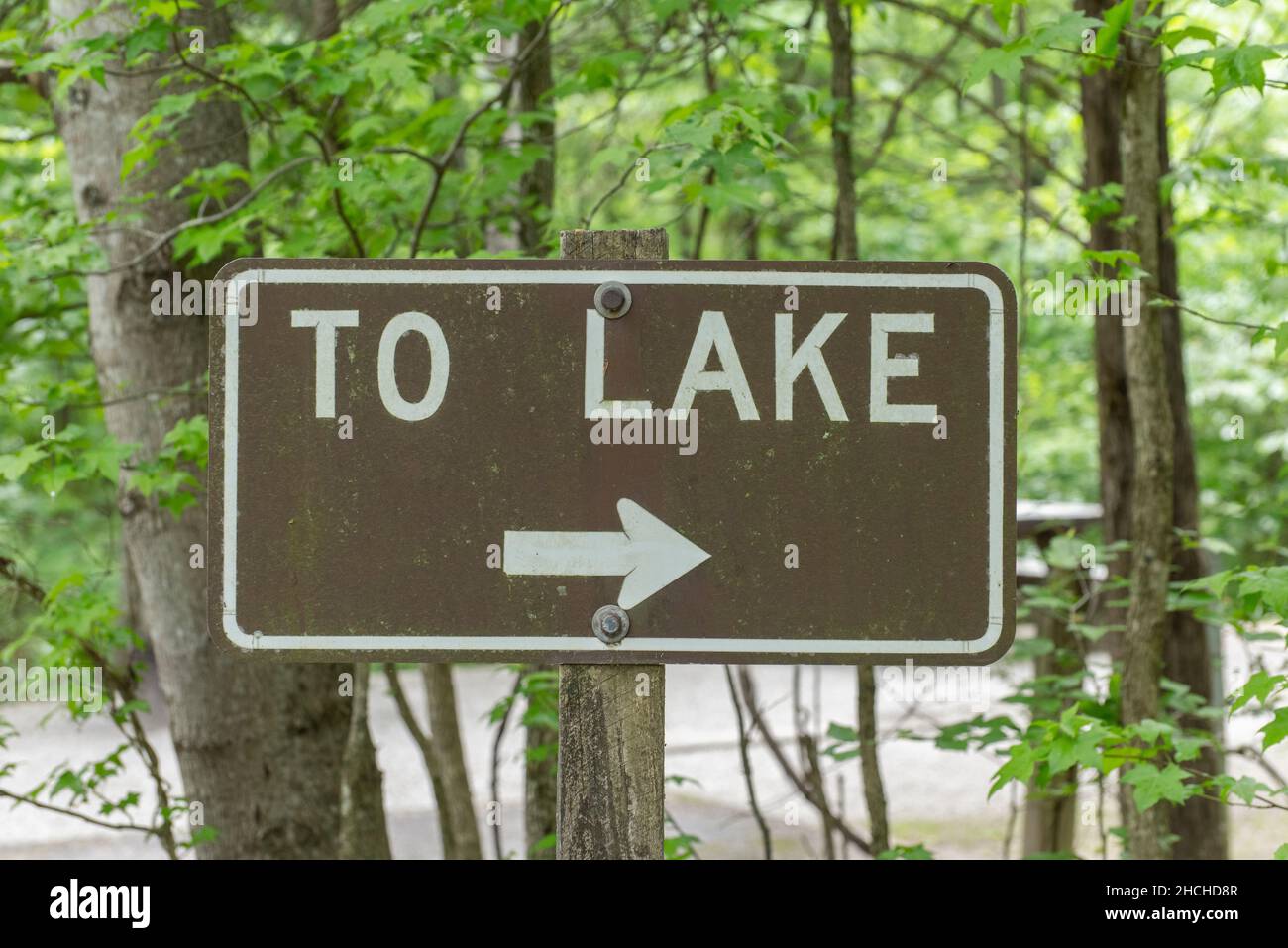 Sign pointing the direction to a lake Stock Photo