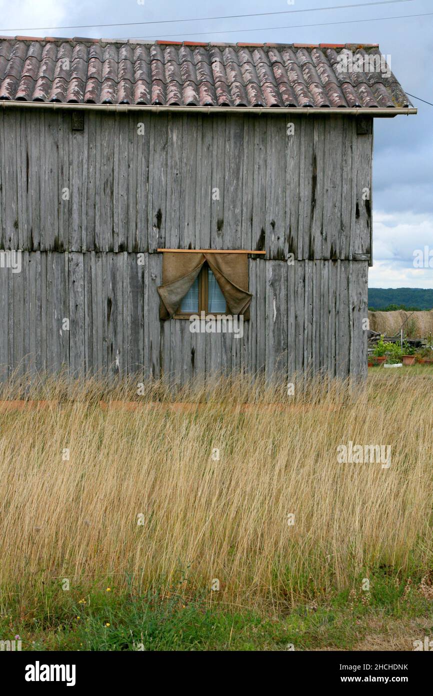 wooden barn with window Stock Photo - Alamy