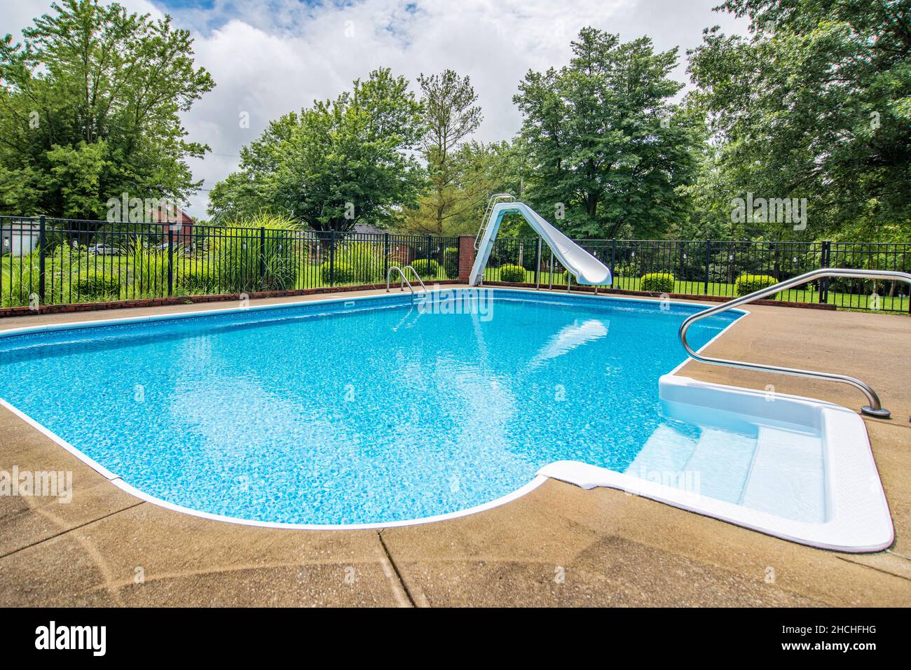Swimming pool in a backyard of an American home Stock Photo