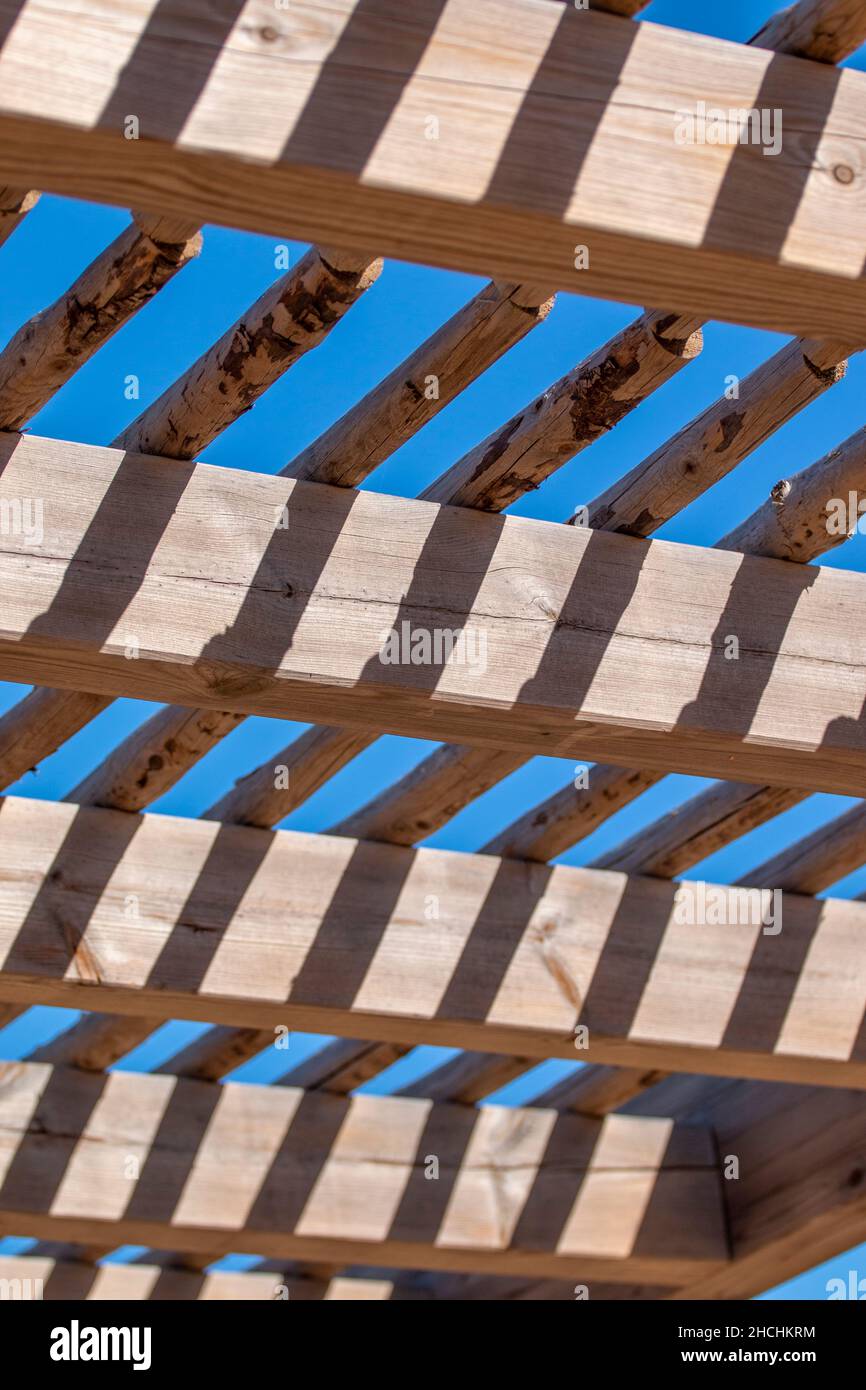 Abstract wooden structure closeup placed on the coastal walkways in the Algarve, Portugal. Stock Photo