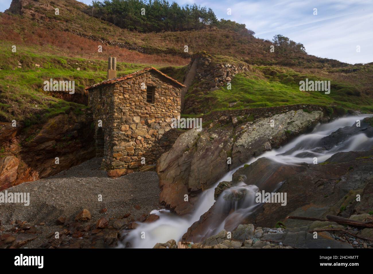 Landscape of Vallina del Gallo Beach and vallin mill on the Asturian coast. Stock Photo