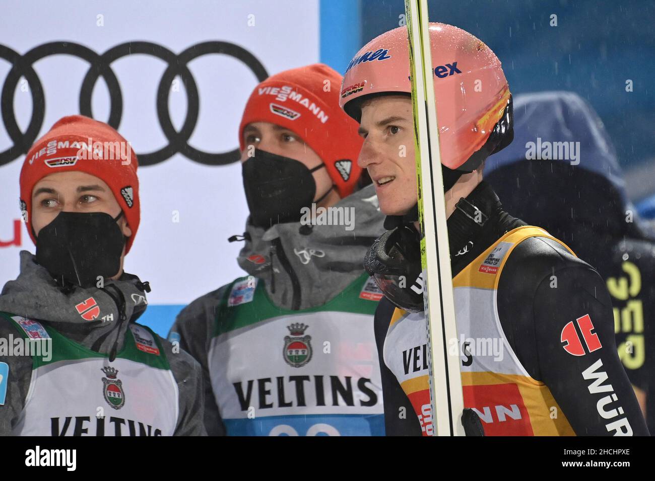 From right: Karl GEIGER (GER), Stephan LEYHE (GER) Markus EISENBICHLER (GER), ski jumping, 70th International Four Hills Tournament 2021/22, opening competition in Oberstdorf, AUDI ARENA on December 29th, 2021. Stock Photo