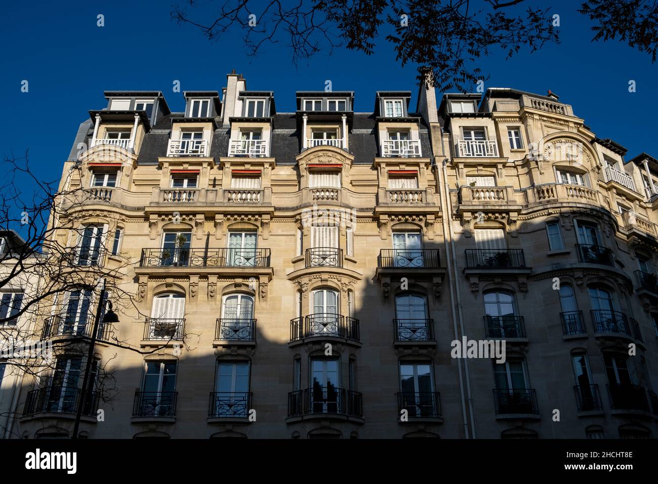 Classical stone facade from Paris smoothly enlightened Stock Photo