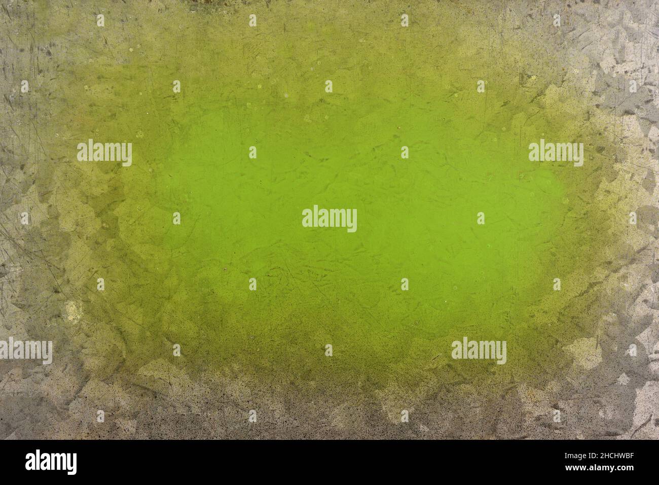 green spray paint on galvanized sheet metal Stock Photo Alamy