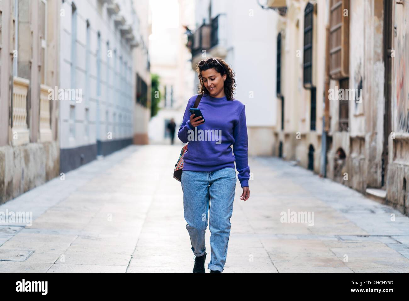 Man and woman walk street hi-res stock photography and images - Alamy