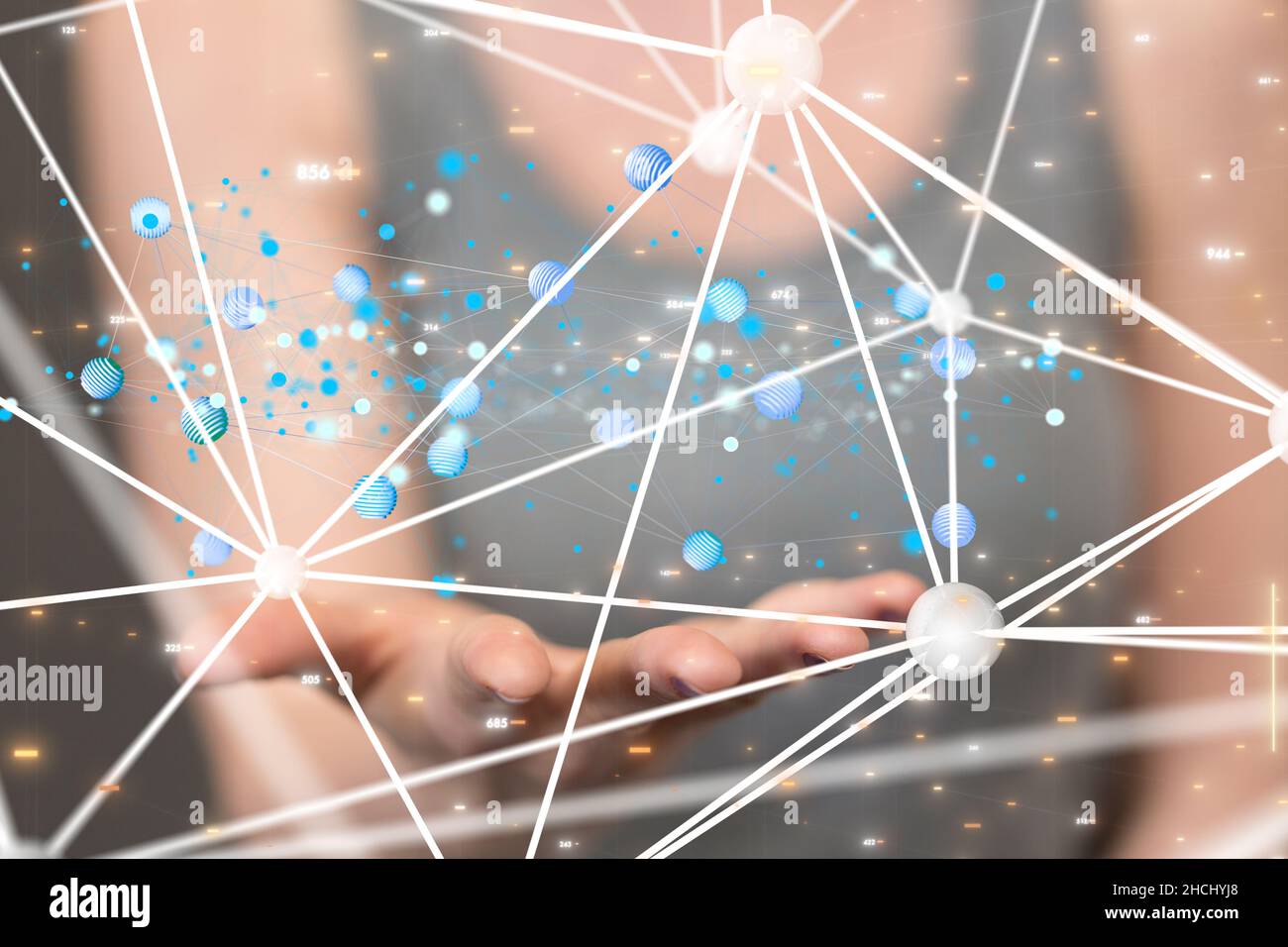 Hand behind the floating dots with connecting lines. Stock Photo