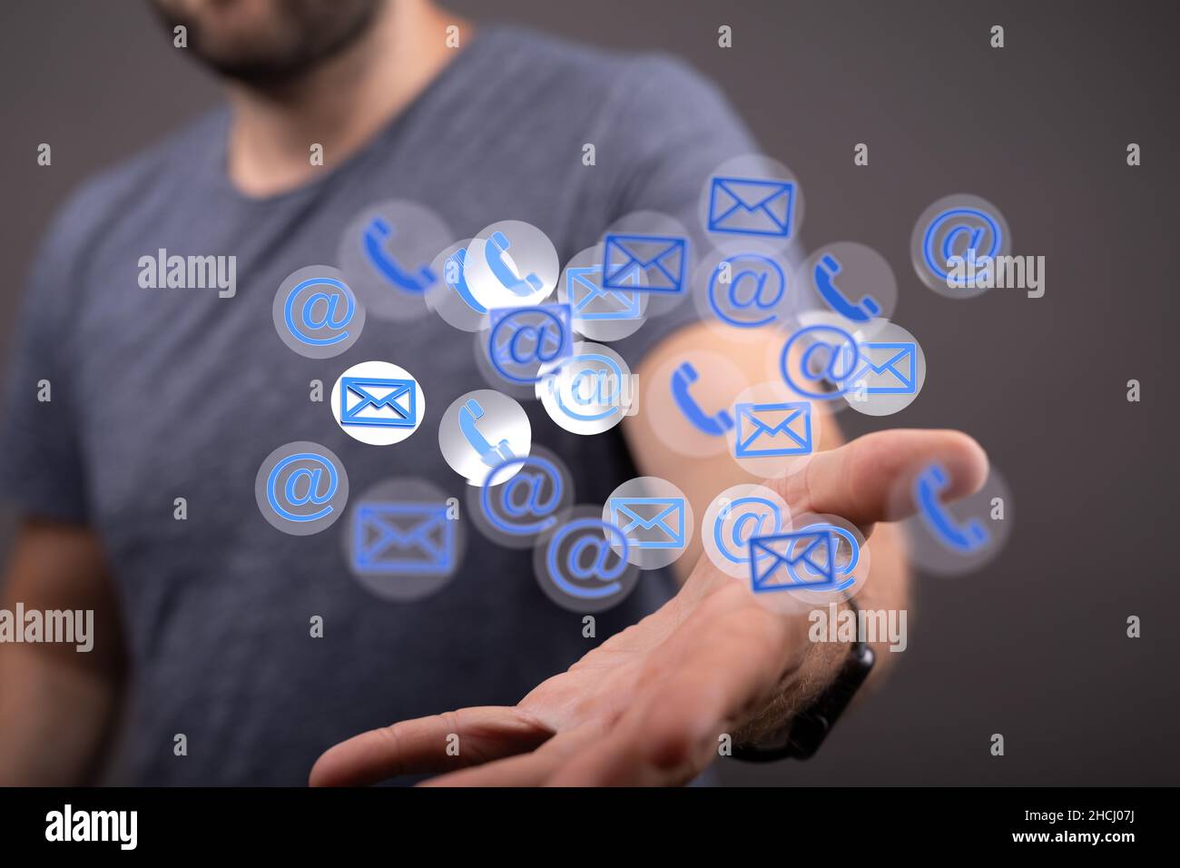 Message and call icons in front of a person / email concept Stock Photo ...