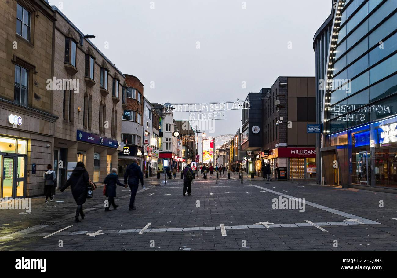 Christmas lights and shoppers on Northumberland Street, Newcastle upon Tyne, UK. Stock Photo
