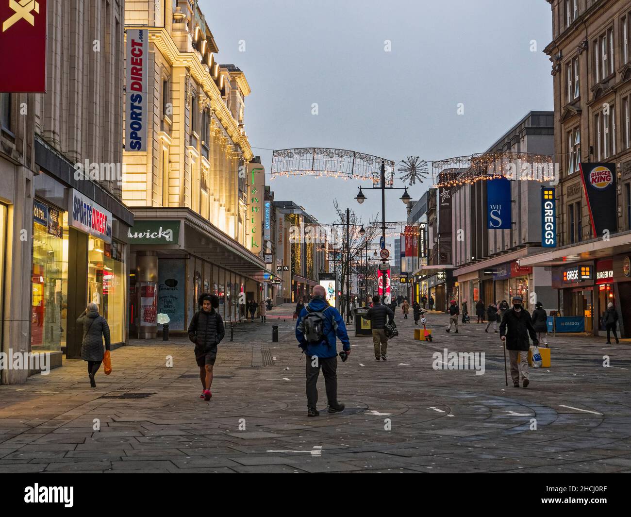 Christmas lights and shoppers on Northumberland Street, Newcastle upon Tyne, UK. Stock Photo
