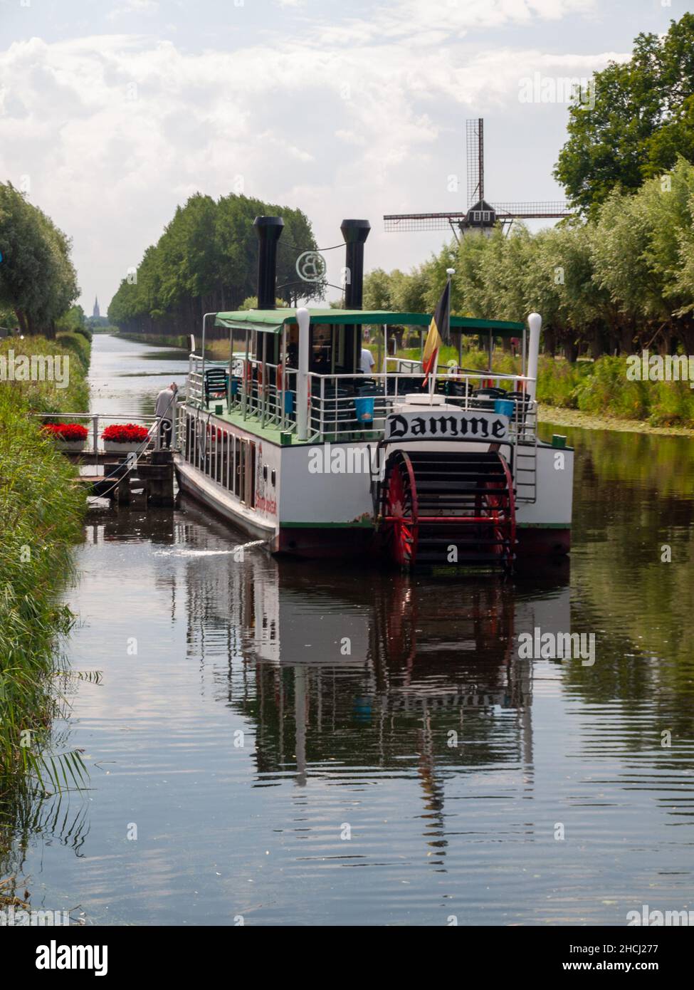 A tourist boat in Damme Canal Stock Photo