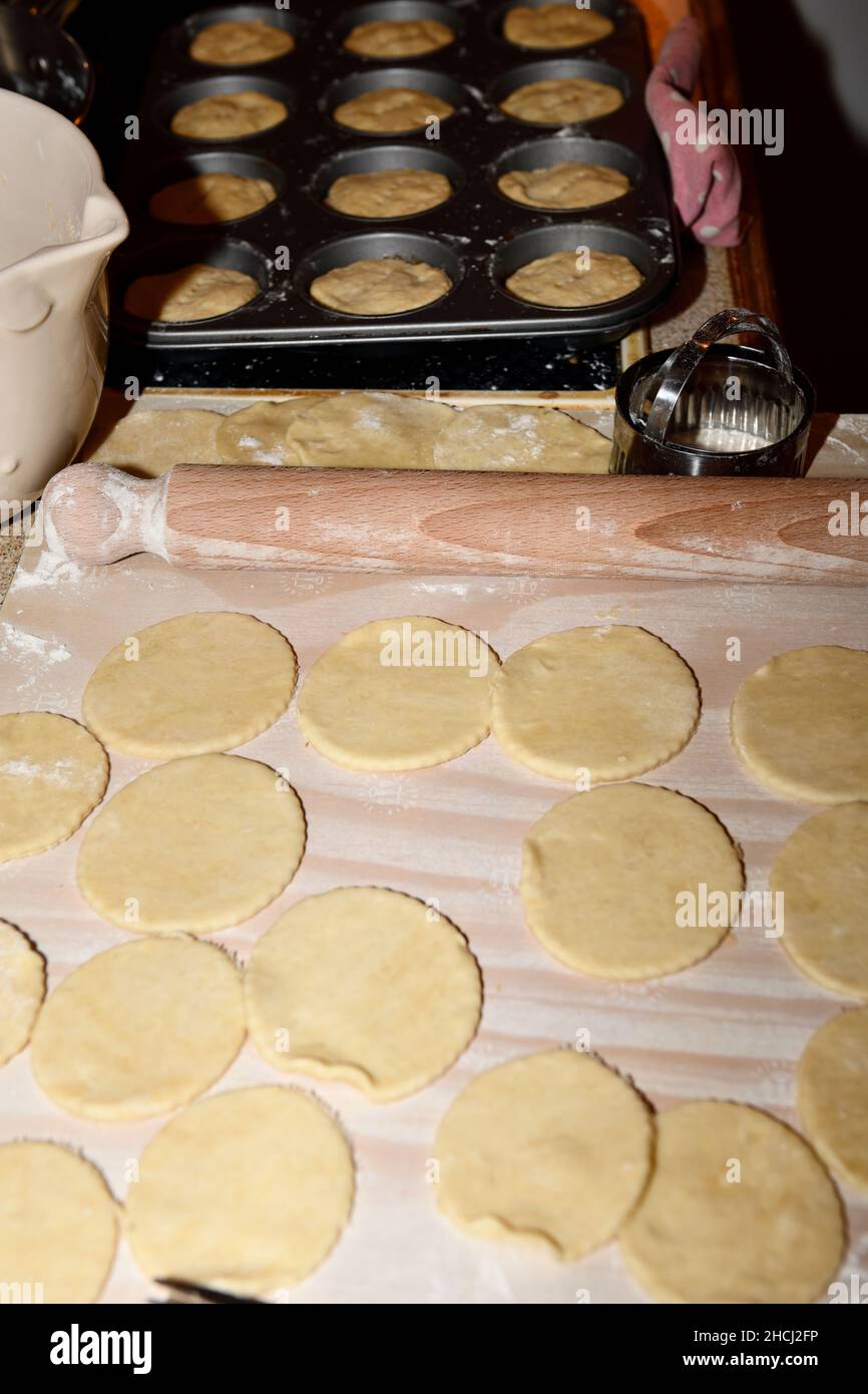 Mince Pies in tray before cooking and pastry cut Christmas 2021 Stock