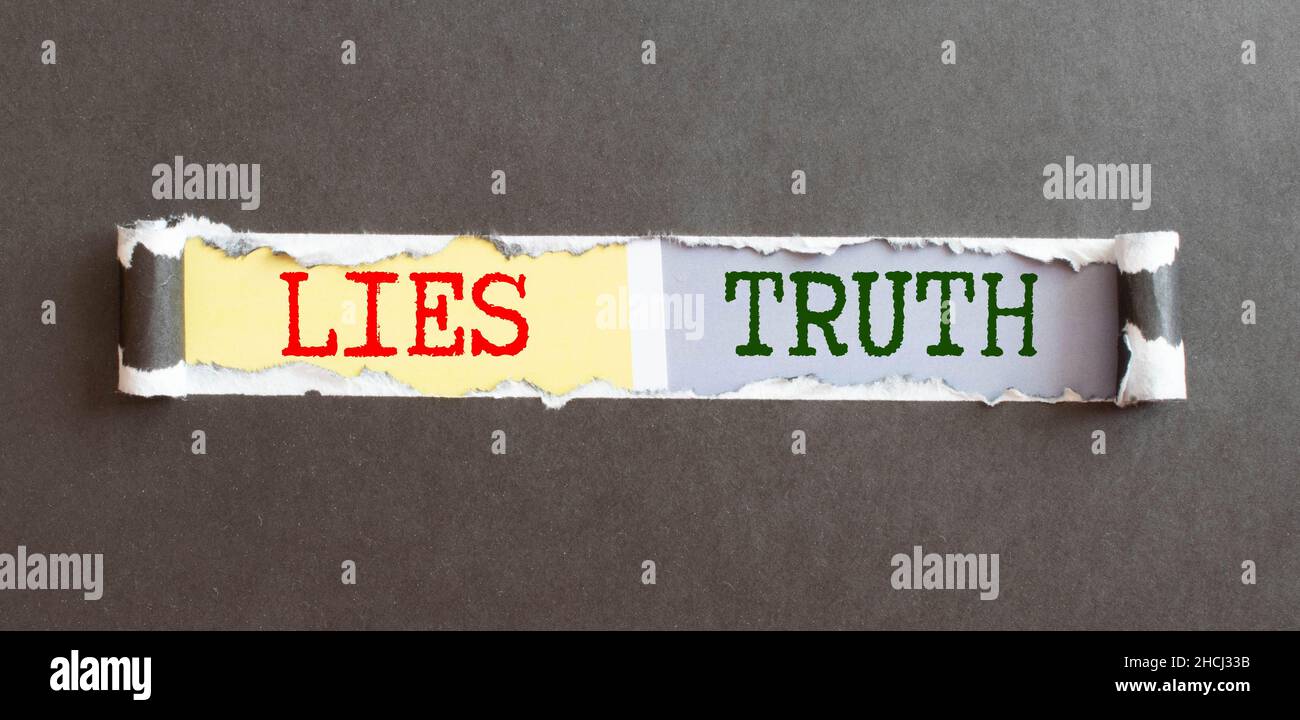 Crossing out Lies and writing Truth on a blackboard Stock Photo