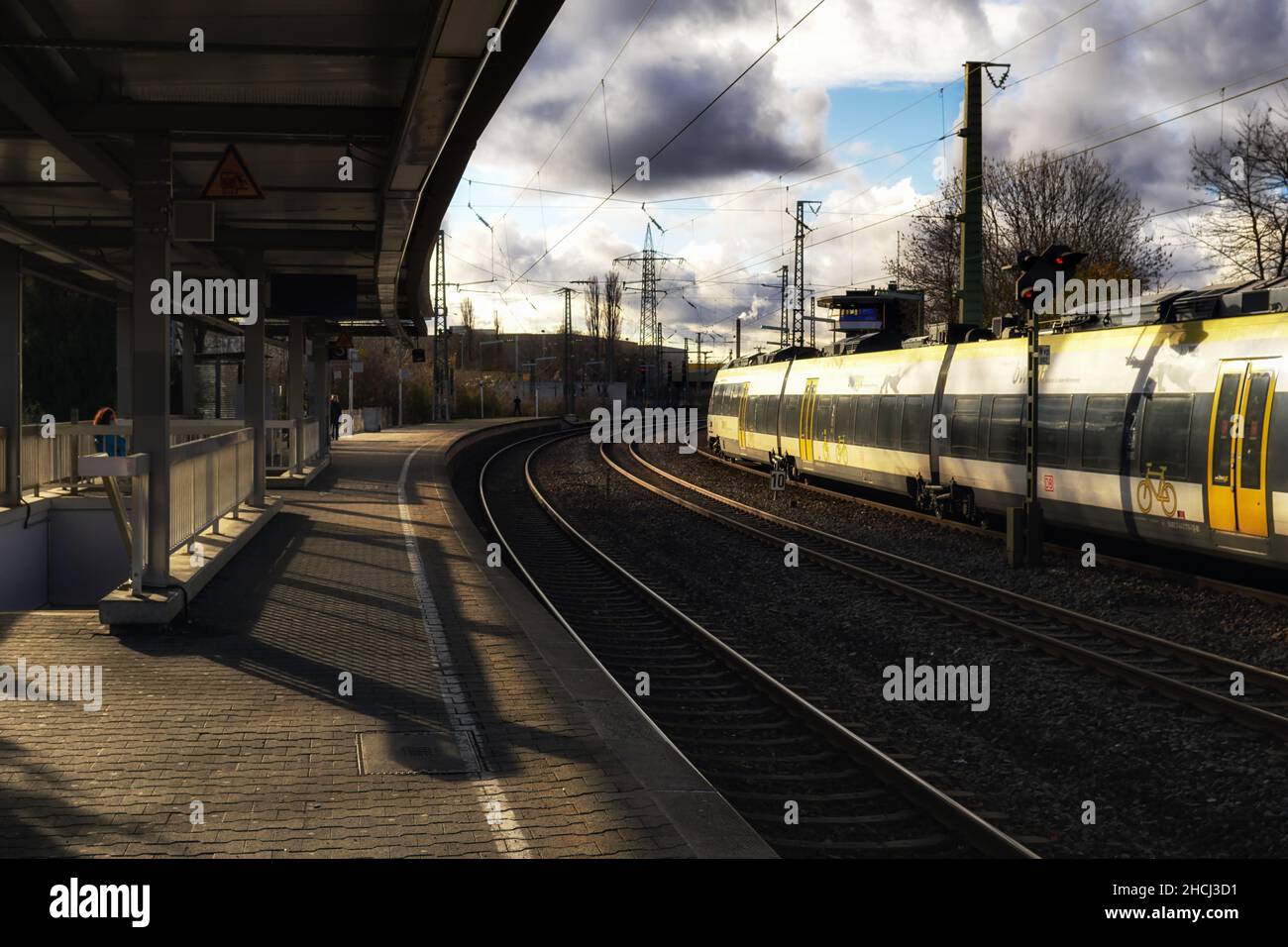 Waiblingen,Germany,December 05,2021: Train station at this old station at white and yellow train of the Deutsche Bahn company BWegt was stopping. Stock Photo