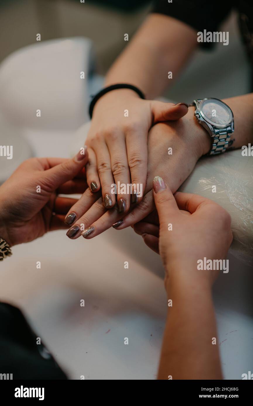 High angle shot of a person getting their nails done Stock Photo Alamy