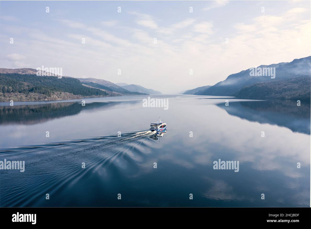 Loch Ness Tour Boat Travels out in Search of Nessie Stock Photo