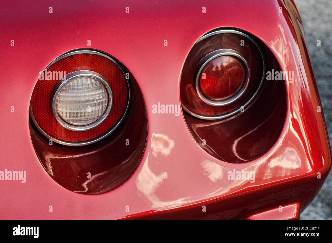 Closeup of the lights of a red retro car Stock Photo