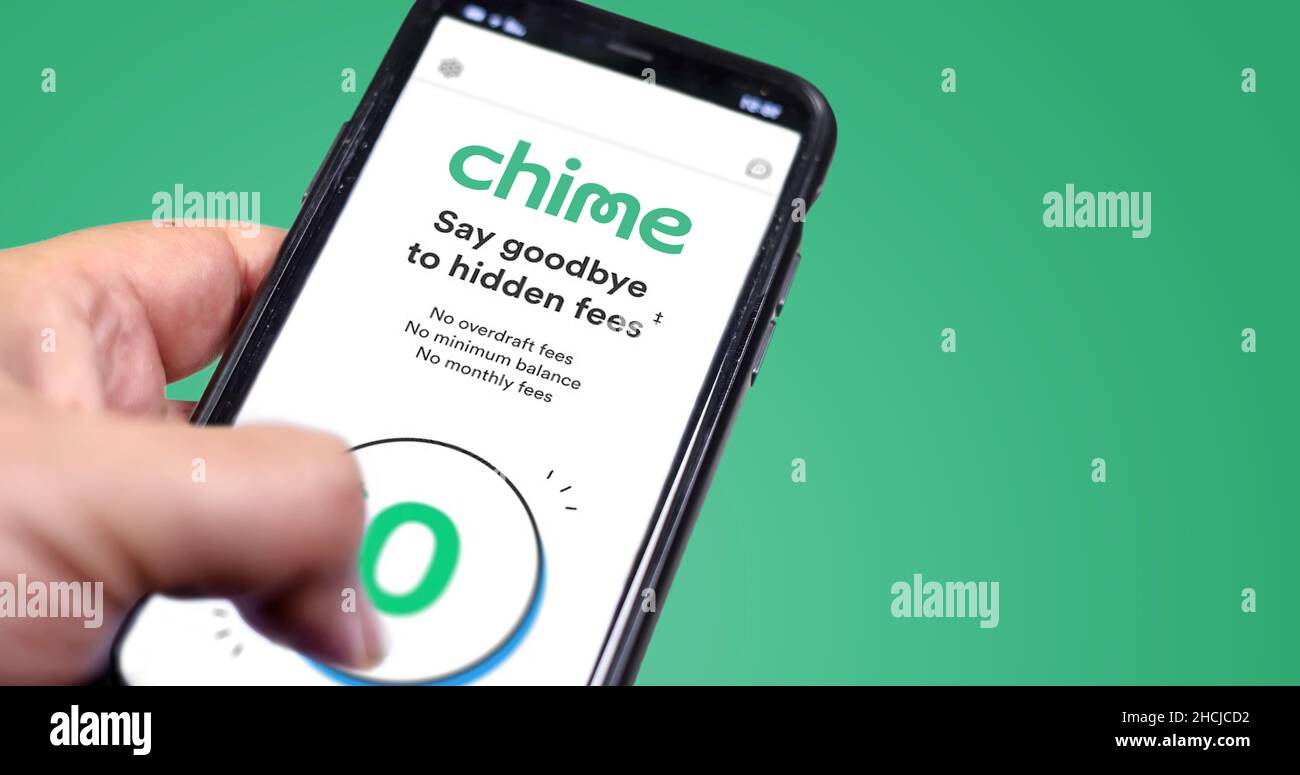 San Francisco, Ca, USA, December 2021: A hand holding a phone with the Chime app on the screen. Chime is an American financial technology company whic Stock Photo
