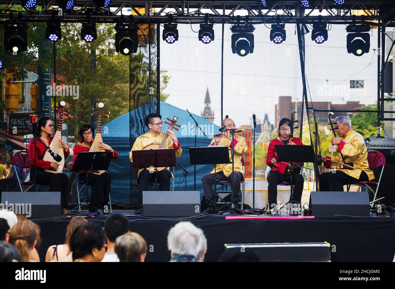 Toronto, Canada - 08 19 2018: Traditional Chinese music performers on the main stage of the 18th Toronto Chinatown Festival. Stock Photo