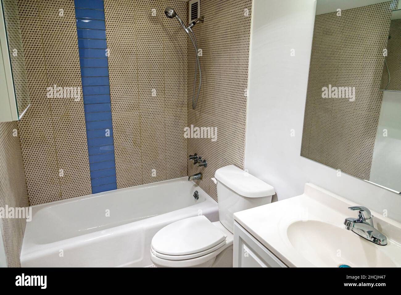 Miami Beach Florida condominium condo unit apartment inside interior sink toilet bath tub shower loo Stock Photo