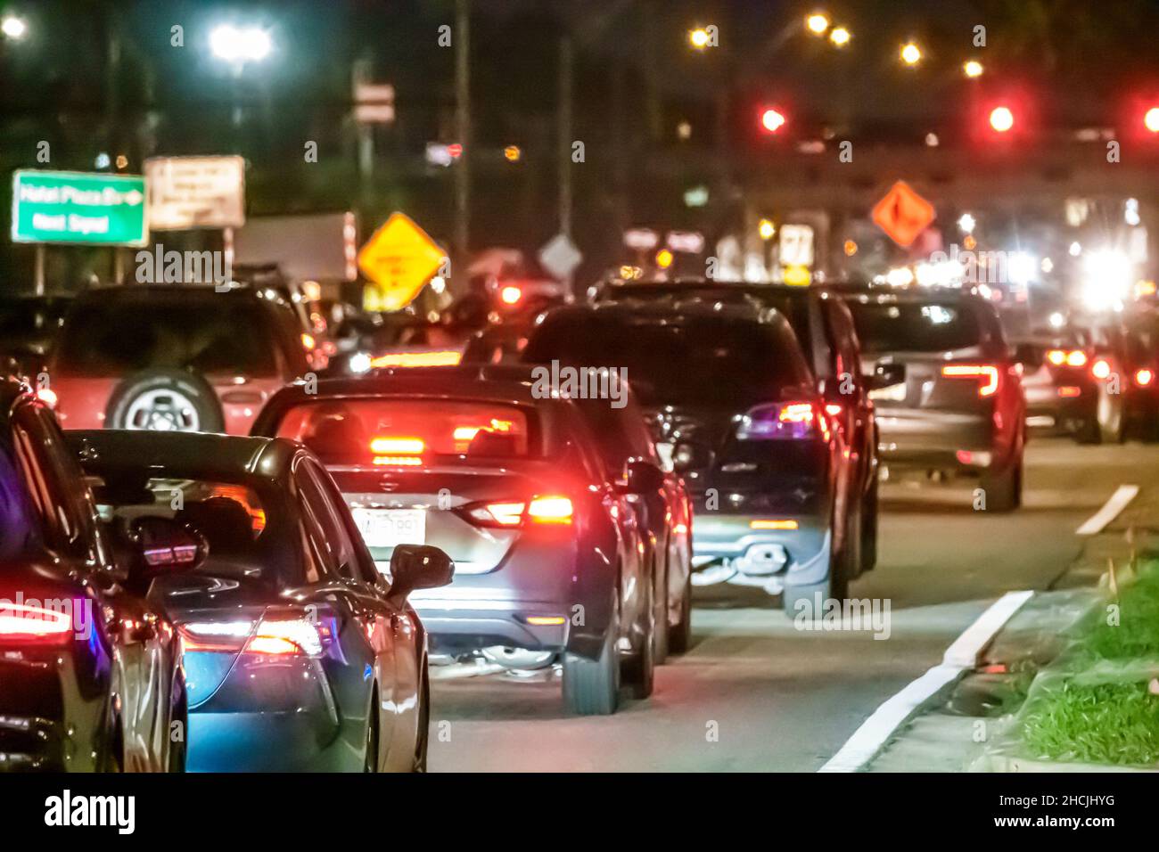 Orlando Florida South Apopka Vineland Road night nighttime vehicles cars traffic slow moving stopped Stock Photo