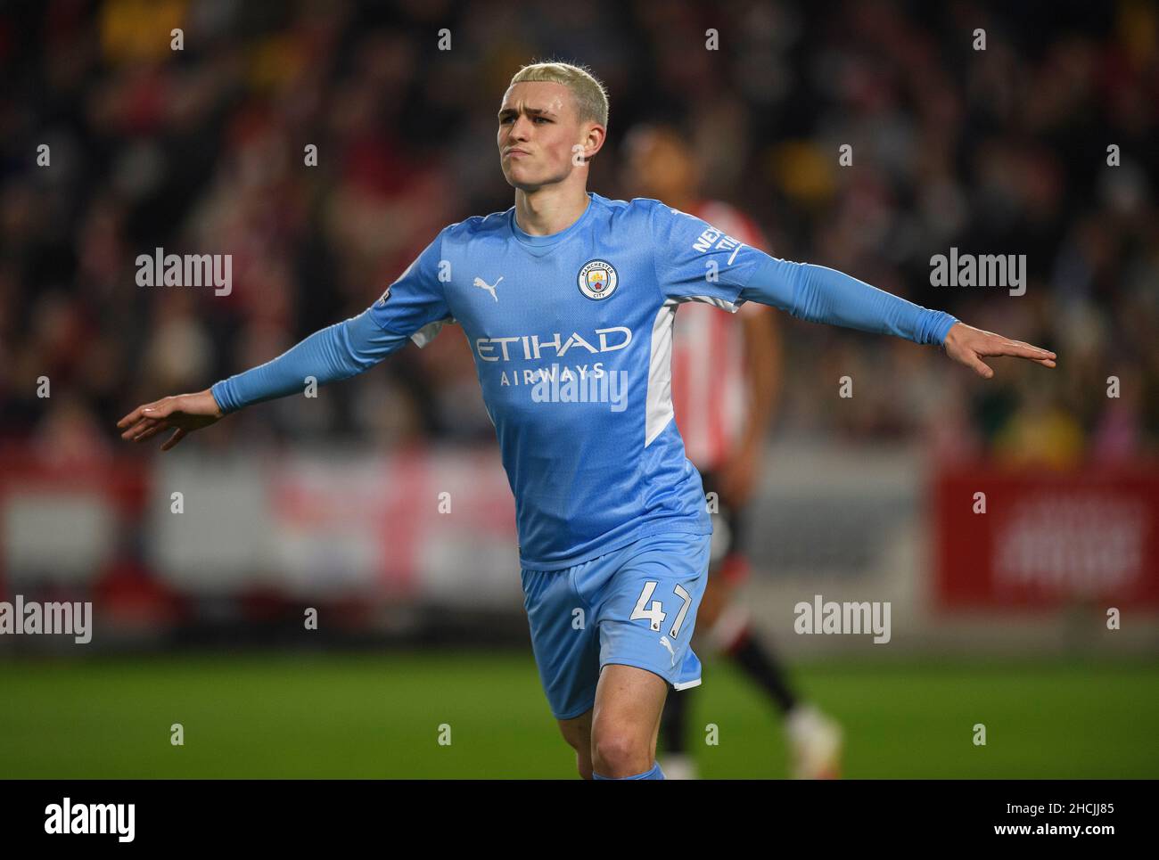 London, UK. 29th Dec, 2021. Phil Foden celebrates his goal during the Premier League match at the Brentford Community Stadium. Credit: Mark Pain/Alamy Live News Stock Photo