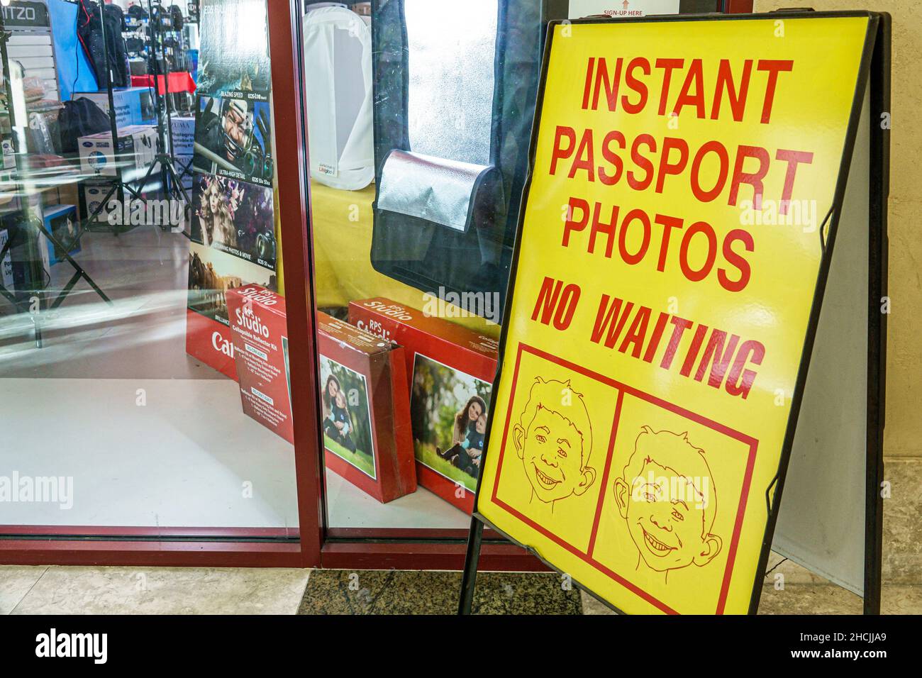 West Palm Beach Florida business sign instant passport photos no waiting Stock Photo