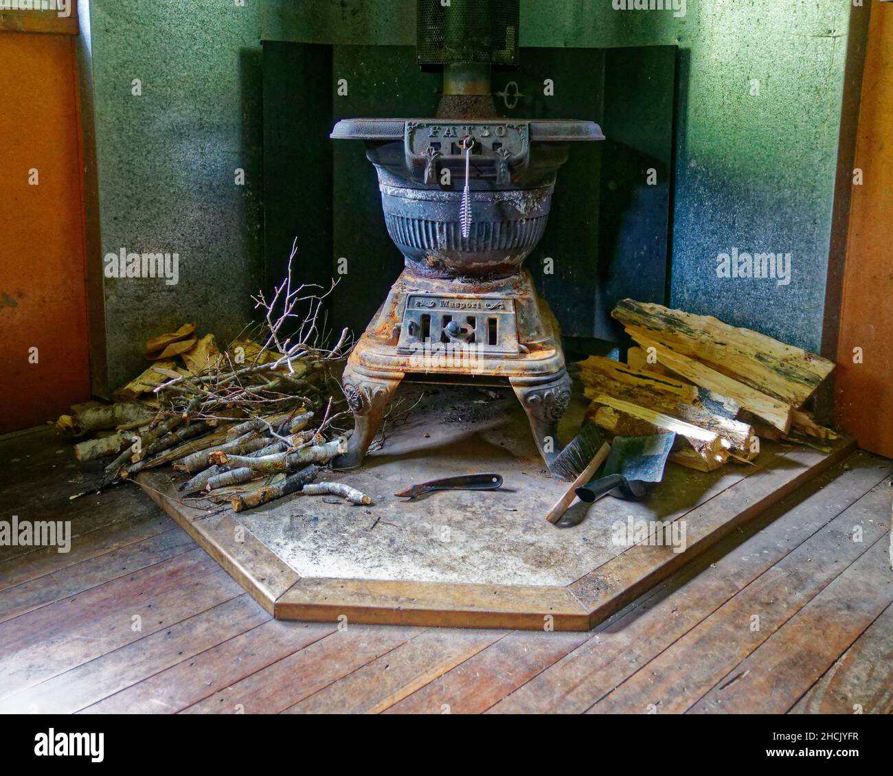 Cast iron pot belly bellied stove heater hires stock photography and