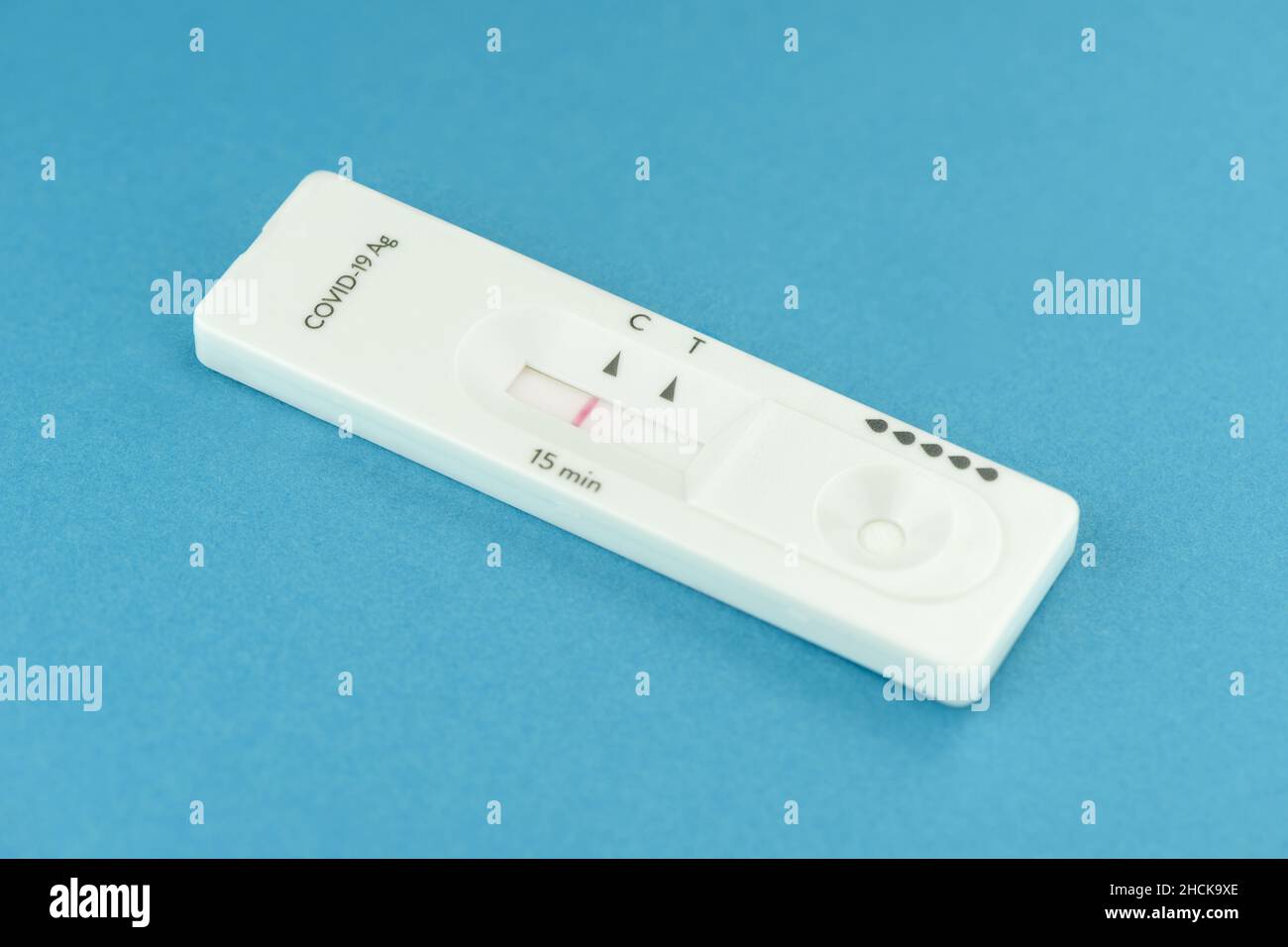 close view of negative antigen covid-19 test on blue background Stock Photo