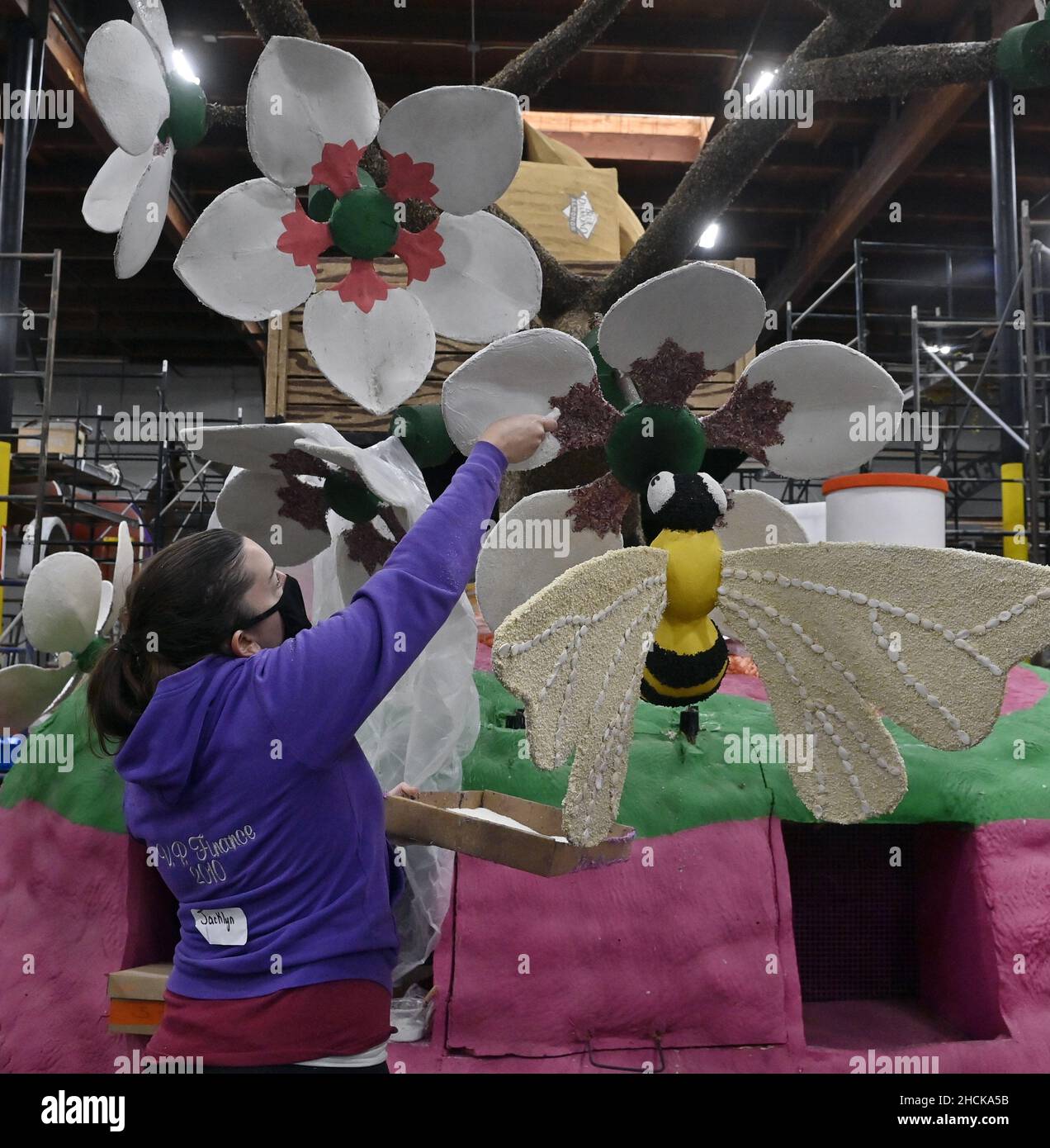 Pasadena, United States. 29th Dec, 2021. Volunteers use thousands of flowers and other plant material to prepare floats for the 133rd annual Tournament of Roses Parade in Pasadena, California on Wednesday, December 29, 2021. The Rose Parade will be televised live from Pasadena on January 1, 2022. Photo by Jim Ruymen/UPI Credit: UPI/Alamy Live News Stock Photo