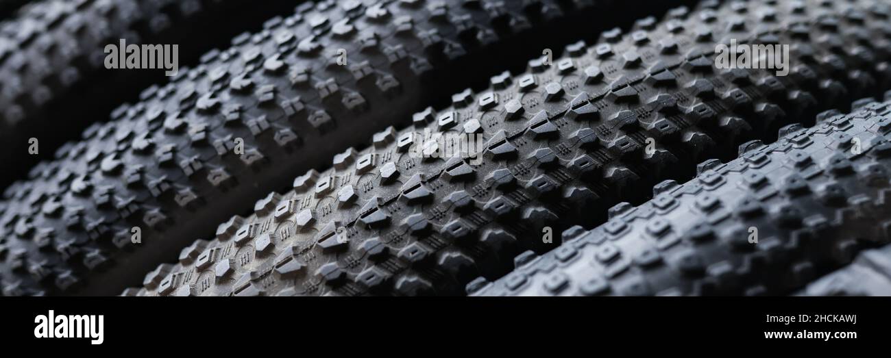Closeup of black rubber tires from bicycle Stock Photo