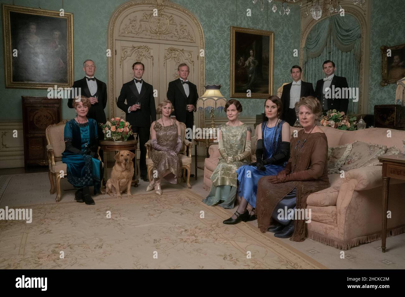 RELEASE DATE: March 18, 2022. TITLE: Downton Abbey: A New Era. STUDIO: Universal Pictures.DIRECTOR: Simon Curtis. PLOT: Follow-up to the 2019 feature film in which the Crawley family and Downton staff received a royal visit from the King and Queen of Great Britain. STARRING: (l-r.) Samantha Bond as Lady Rosamund, Douglas Reith as Lord Merton, Harry Hadden-Paton as Lord Hexham, Laura Carmichael as Lady Edith Hexham, Hugh Bonneville as Lord Grantham, Elizabeth McGovern as Lady Grantham, Michelle Dockery as Lady Mary Talbot, Penelope Wilton as Lady Merton, Robert James Collier as Thomas Barrow an Stock Photo