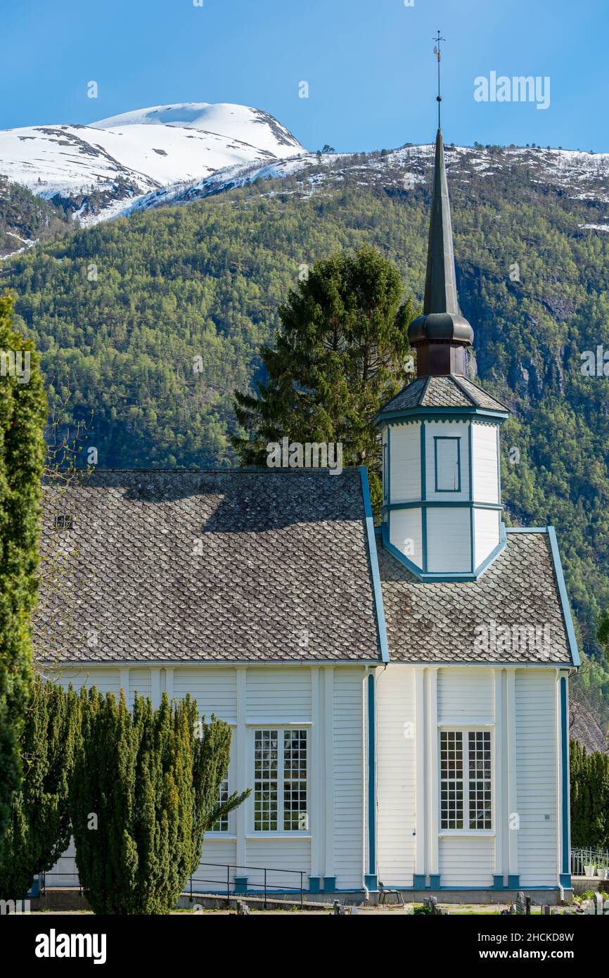 VALLDAL, NORWAY - 2020 MAY 29. White church at Valldalen with mountains in the background. Stock Photo