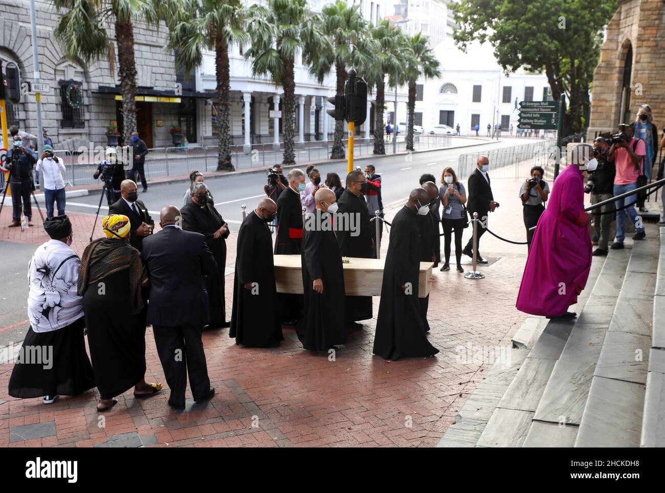 Archbishop of Cape Town Thabo Makgoba walks in front of the casket containing the body of Archbishop Desmond Tutu during arrival at St Georges cathedral for his lying in state, in Cape Town, South Africa, December 30, 2021.  REUTERS/Mike Hutchings Stock Photo