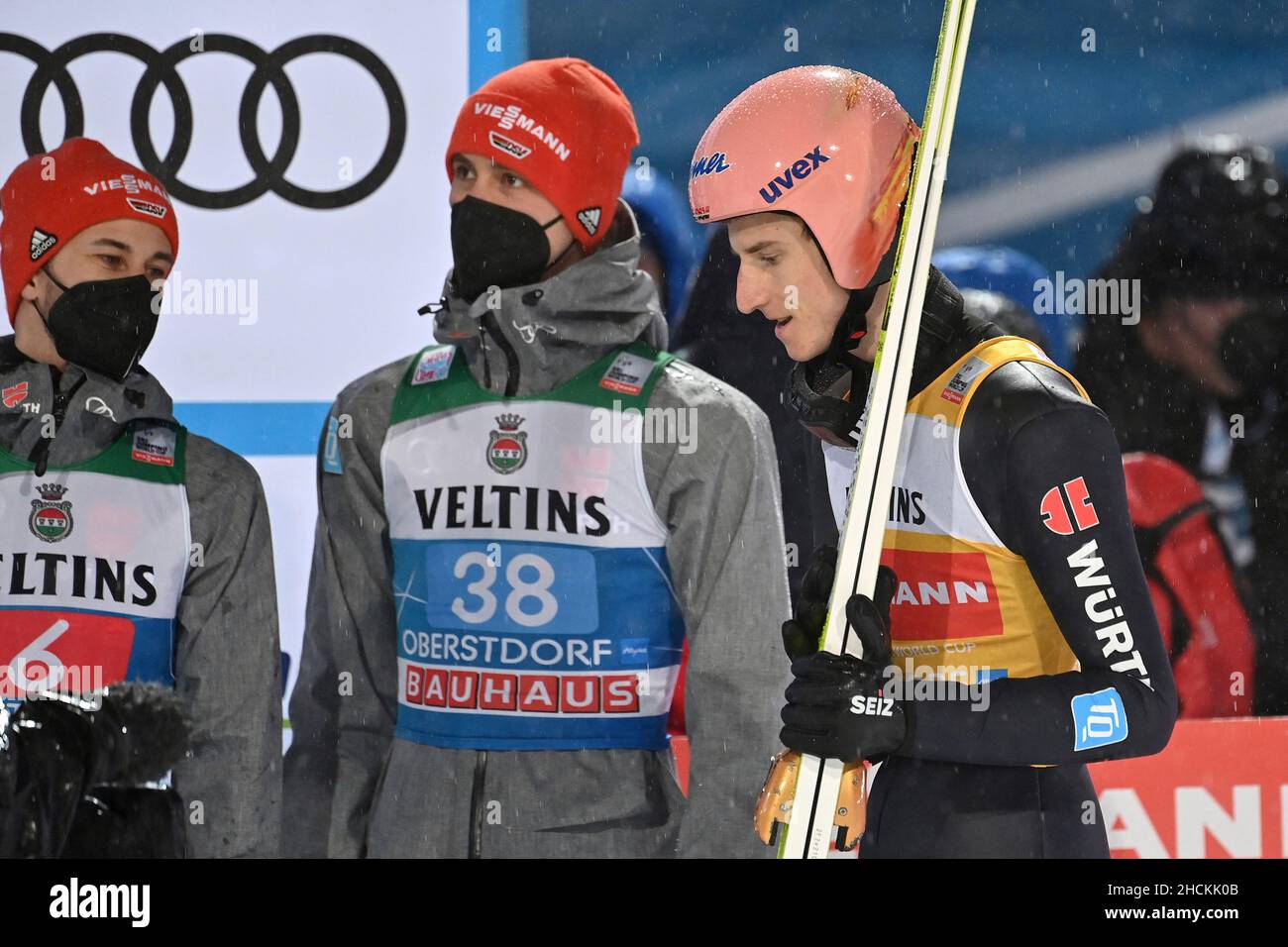 From right: Karl GEIGER (GER), Stephan LEYHE (GER) Markus EISENBICHLER (GER), ski jumping, 70th International Four Hills Tournament 2021/22, opening competition in Oberstdorf, AUDI ARENA on December 29th, 2021. Stock Photo
