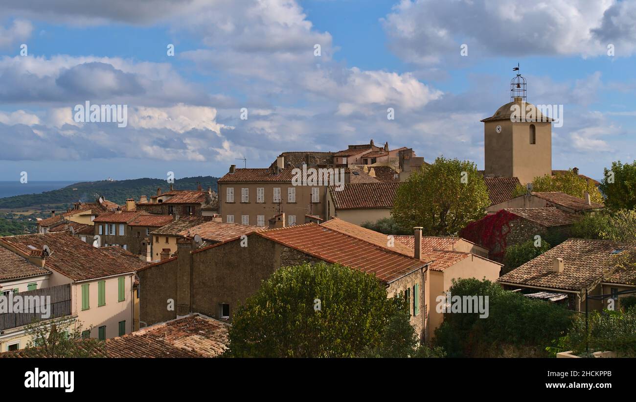 View over the historic center of small village Ramatuelle, French Riviera at the mediterranean coast with old church and traditional buildings. Stock Photo