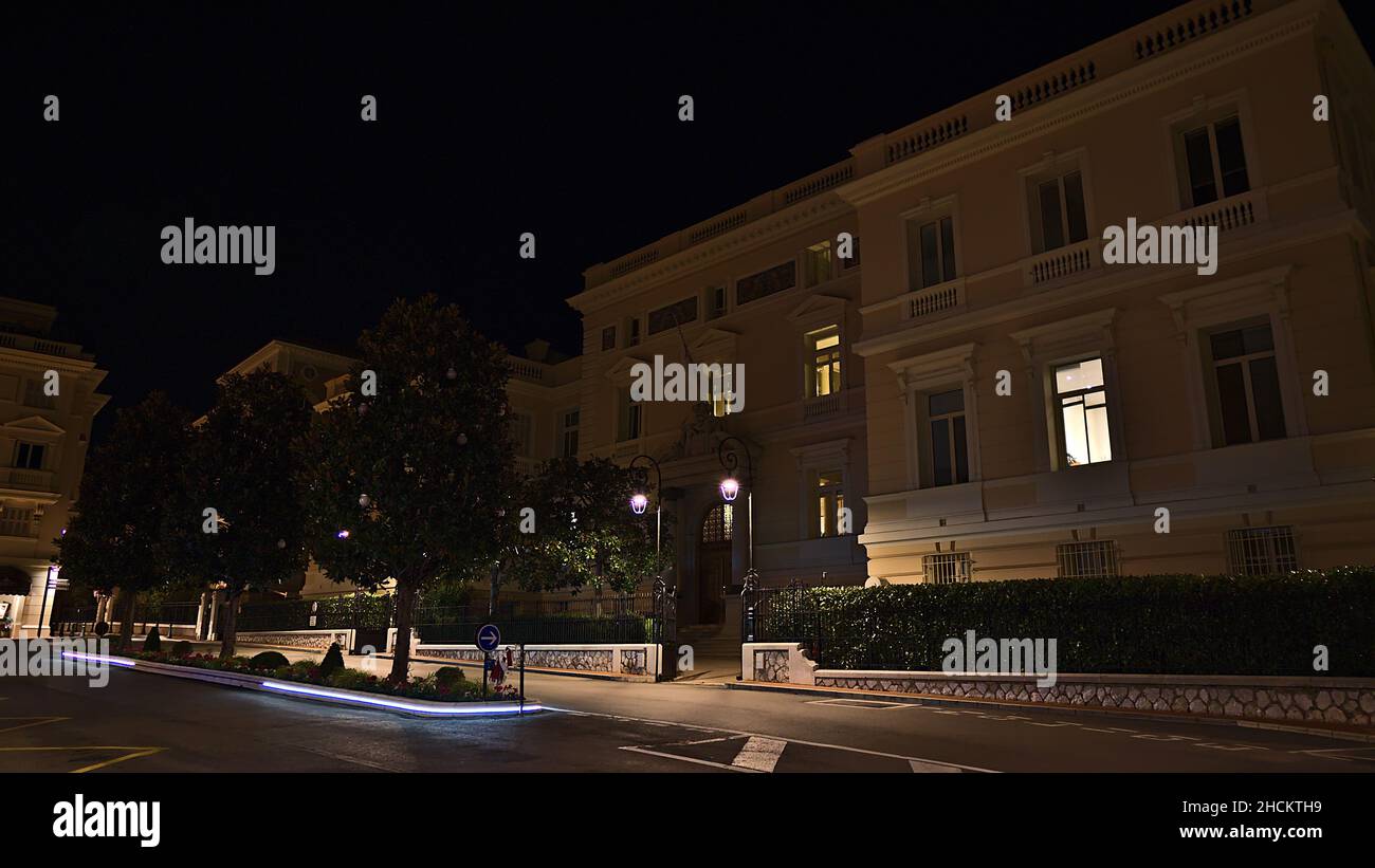 Night view of the Ministry of State of Monaco (Ministere d'Etat) located in an old building in the historic district Monaco-Ville with empty street. Stock Photo