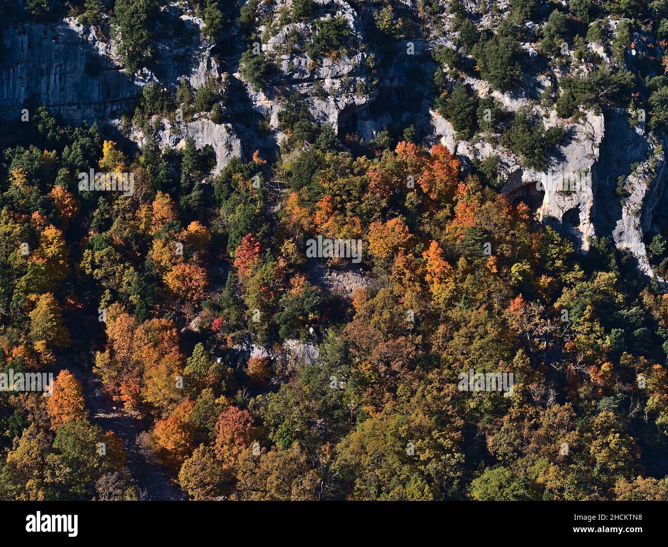 Stunning view of the steep slope of majestic ravine Verdon Gorge (Gorges du Verdon) in Provence region in the south of France in autumn season. Stock Photo